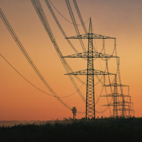Transmission lines at sunset