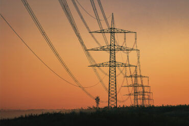Transmission lines at sunset