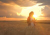 Female farmer with sunlight and storm