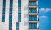 Building with windows and clouds
