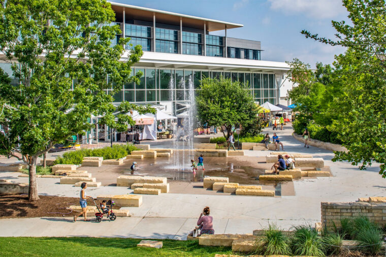Mueller fountain park and commercial/institutional space.