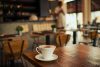 Coffee cup on rustic diner table