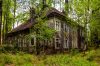 Large abandoned house in the forest