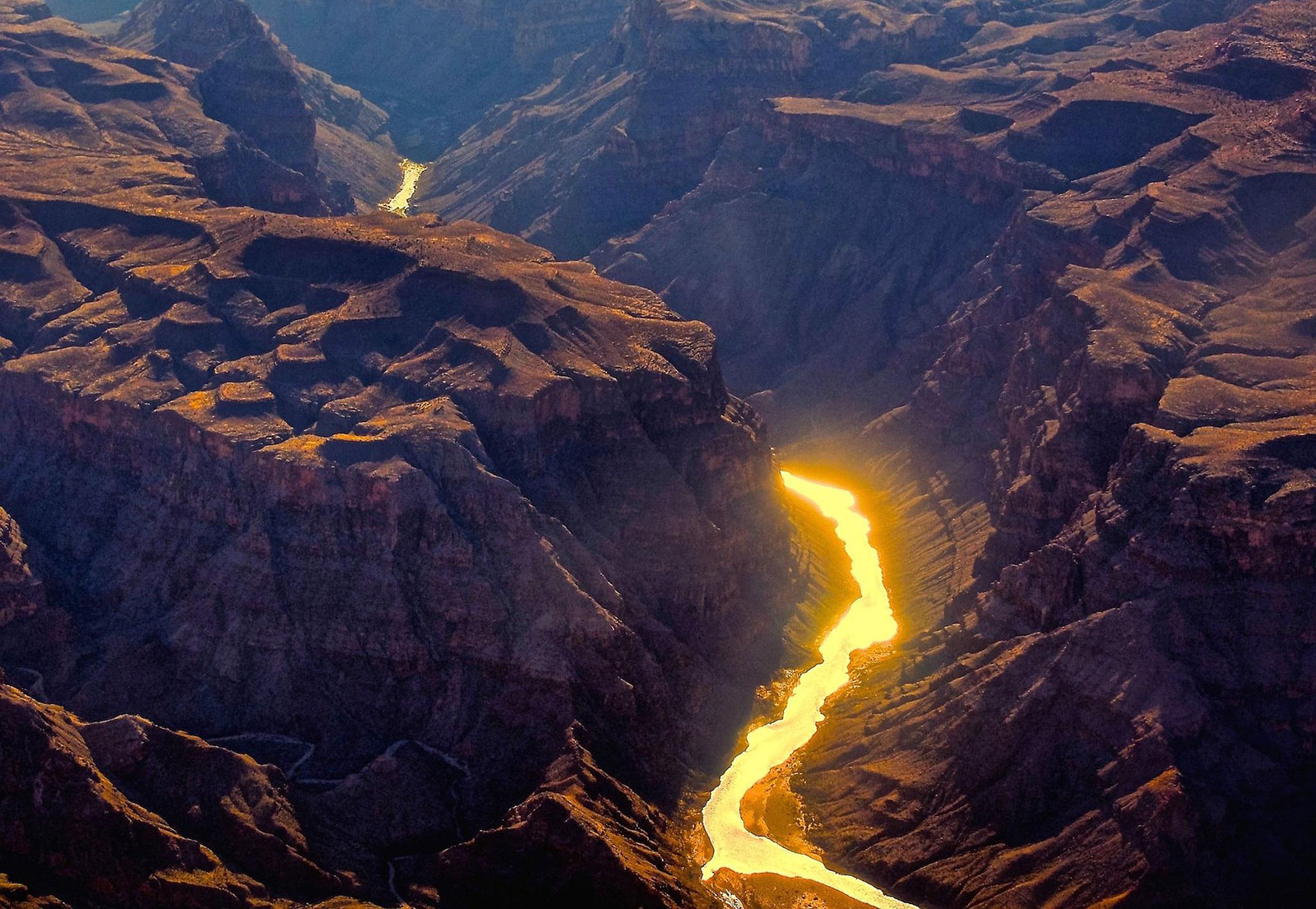 Golden light on the Colorado River in the Grand Canyon