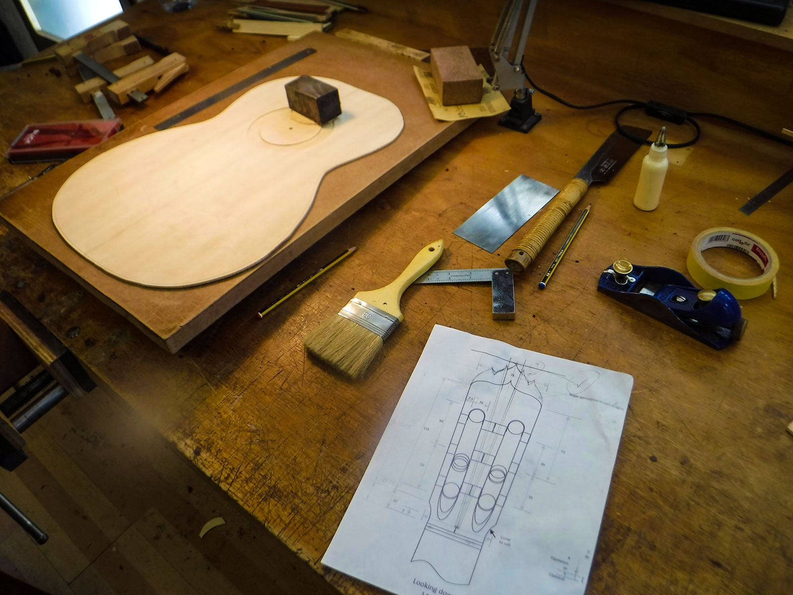 Guitar front, tools, and sketches