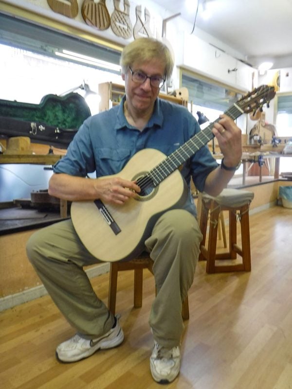 Karl plays his guitar